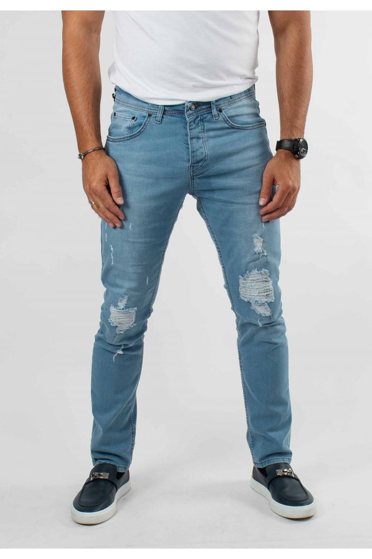 Jean délavé bleu avec trous