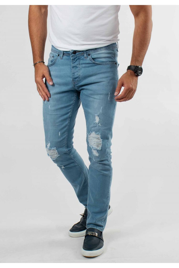 Jean délavé bleu avec trous