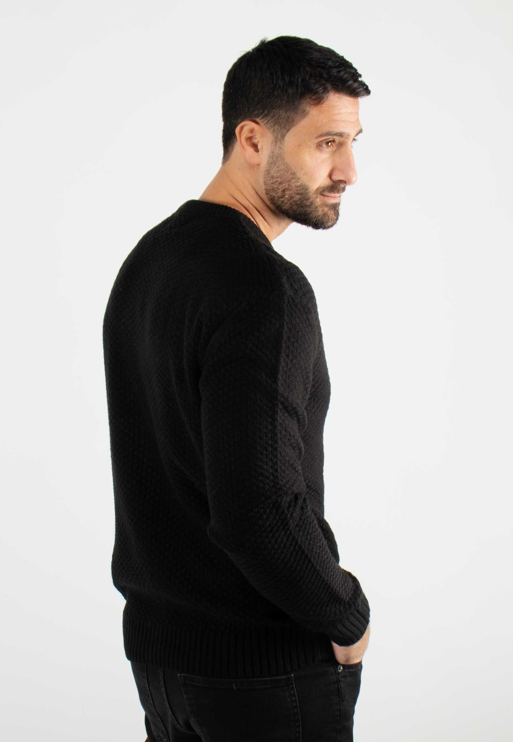 Pull torsadé col rond noir