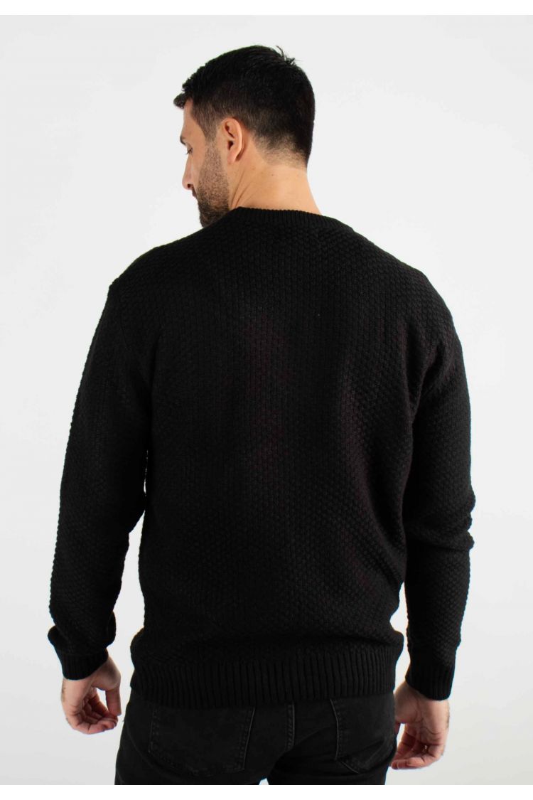 Pull torsadé col rond noir